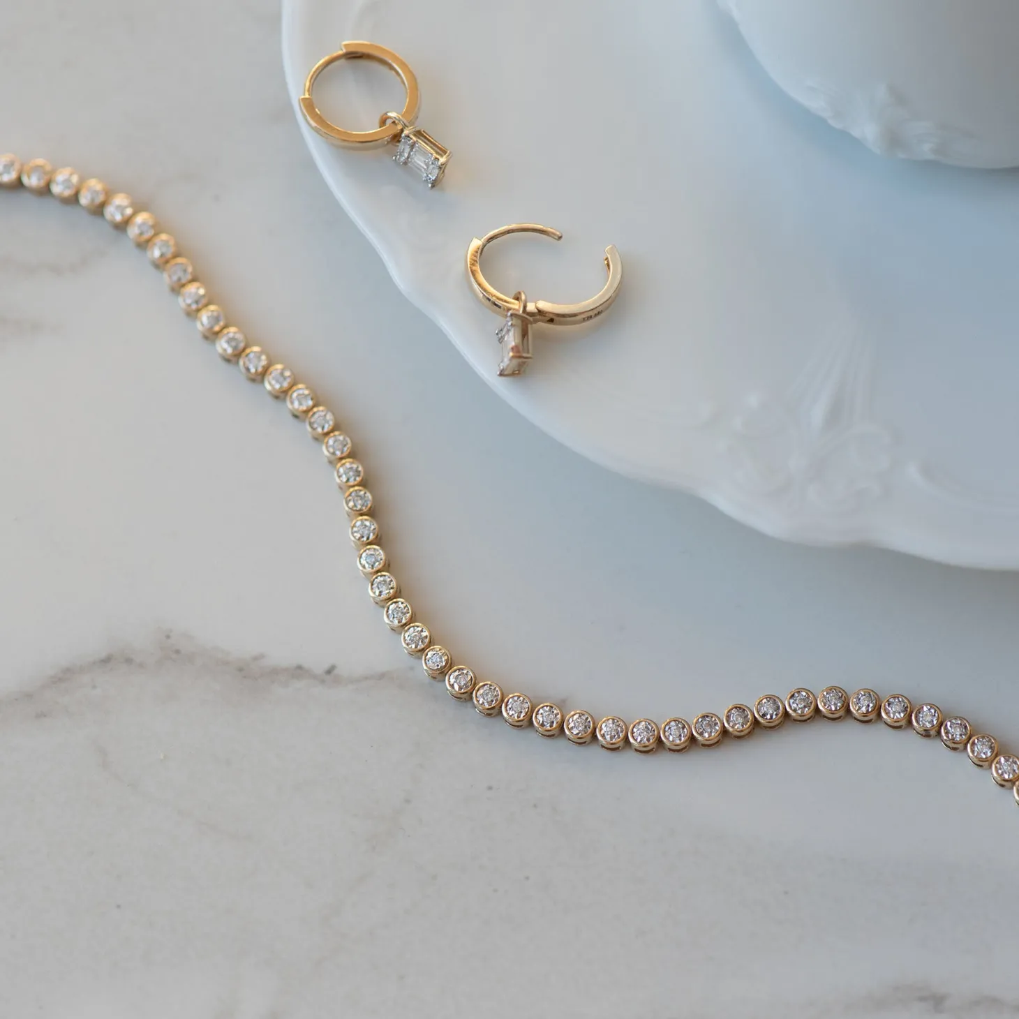Isabel Bernard De la Paix Maxime 14 karaat gouden creolen met diamant 0.18 karaat Shop